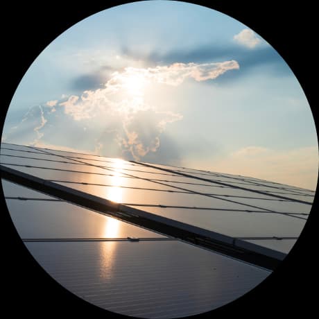 EnFin solar financing — sunset over solar panels